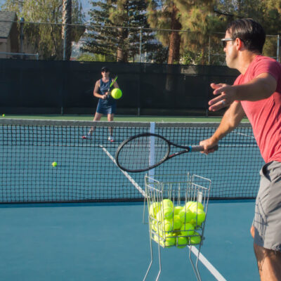 Mixed doubles tennis lesson in summer in Los Angeles