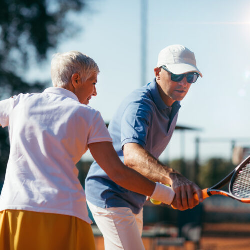 Beautiful Mature Active Woman Playing Tennis
