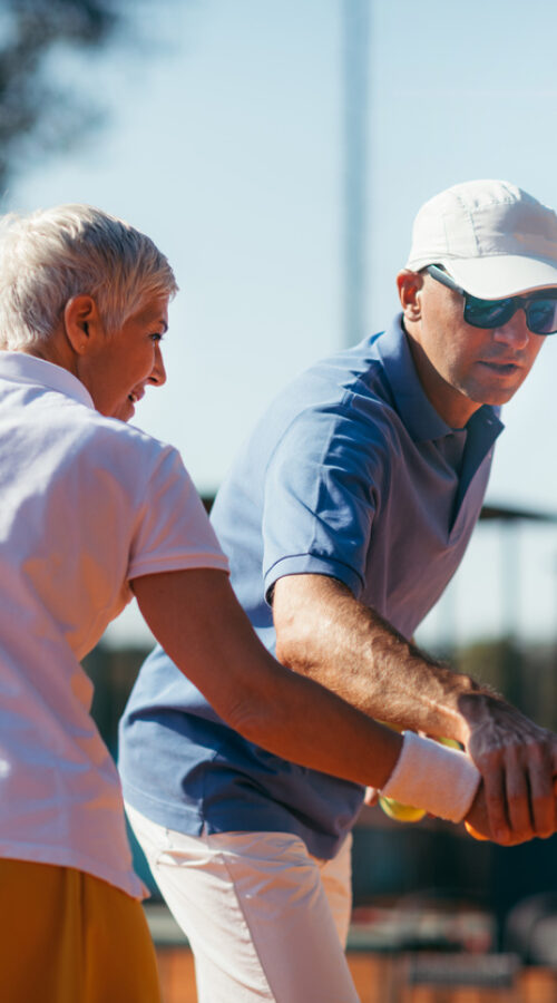 Beautiful Mature Active Woman Playing Tennis